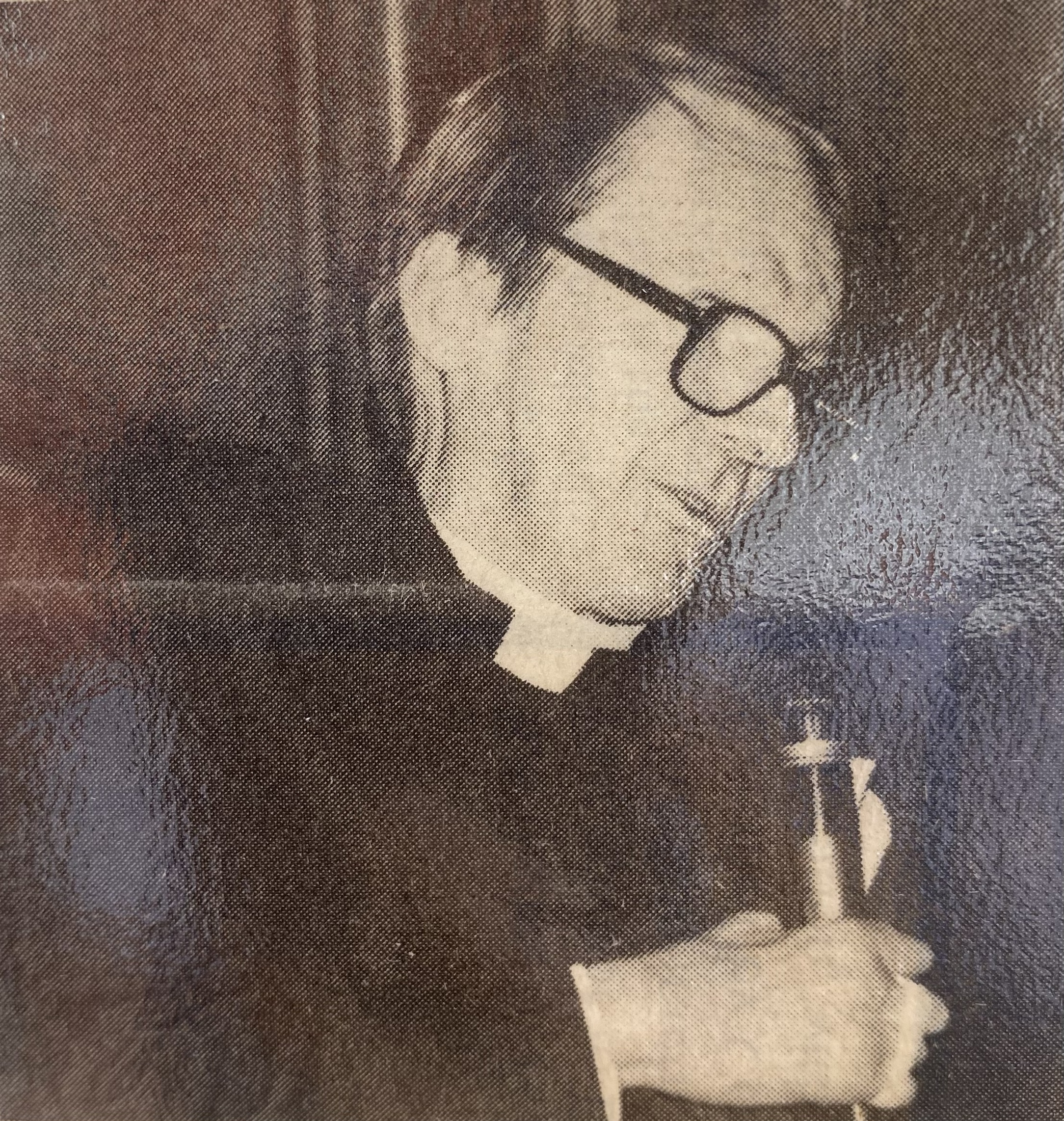 Harry Tisdale speaking into a microphone.